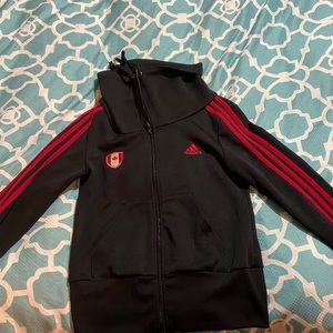 *Rare* adidas track jacket with Canadian symbol on the front